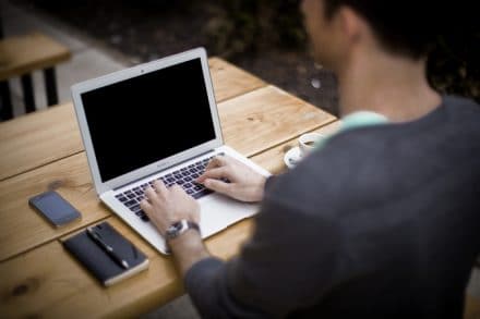 typing on laptop stockshot